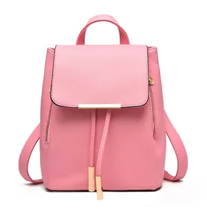 Chic pink Saffiano leather backpack for women featuring gold bar and tassel drawstring