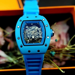 Blue tonneau hollow skeletal wrist watch with black bezel in a luxury gift box