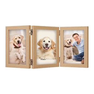 Close-up of triple folding light wood photo frame with silver metal hinges and natural grain