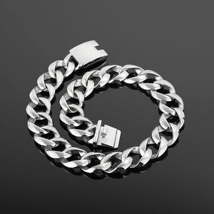 Detailed view of silver thick link Cuban chain necklace with smooth polished metal finish