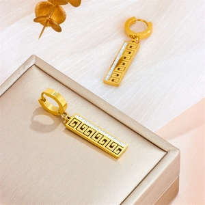 Golden stainless steel clip-on earrings with Greek key pattern and cubic zirconia