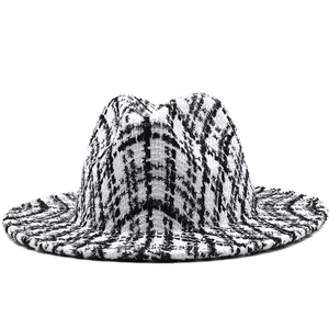 Classic black and white houndstooth fedora hat in textured wool blend with flat brim
