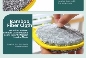 Close-up of bamboo fiber cleaning sponge with yellow edge and hanging loop detail