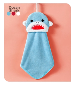 Detail of blue shark-shaped coral velvet hand towel with embroidery and hanging loop