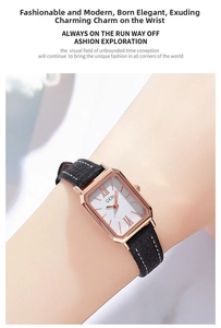Close-up of a ladies' square watch with rose gold case and black leather strap on wrist