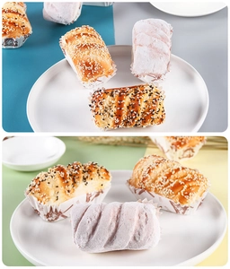 Detailed view of artificial bread models with realistic sesame texture on a white ceramic plate