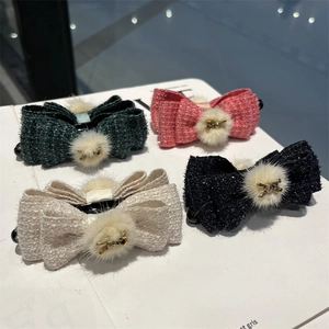 Bow banana clips in tweed fabric with plush poms and small gold bee and rabbit charms