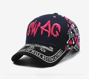 Detail of pink SWAG 3D embroidery on navy baseball cap with graphic printed brim