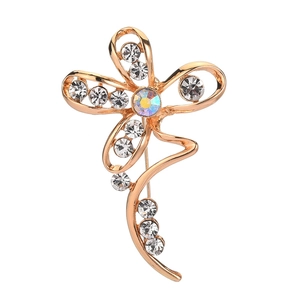 Elegant gold flower brooch with sparkling crystals and a centerpiece rainbow gem