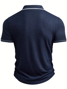 Back view of navy blue polo shirt with textured rib-knit fabric and white stripe detail