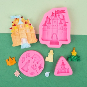 Detail of pink silicone molds for DIY castle and seashell fondant cake decorations