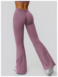 Close-up of high-waisted flare yoga pants with V-shape waistband and ruched booty detail