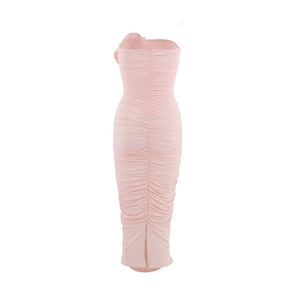 Rear view of pink tube bodycon dress with ruching details and back slit hemline