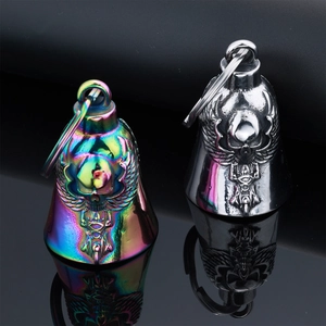 Close-up of skeleton wings guardian bells in silver and rainbow metallic finish