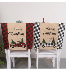 Detailansicht der weihnachtlichen Stuhlhussen aus Jute mit rot-schwarzem Karomuster-LKW