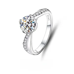 Macro detail of the S925 sterling silver hallmark on a moissanite crisscross band ring