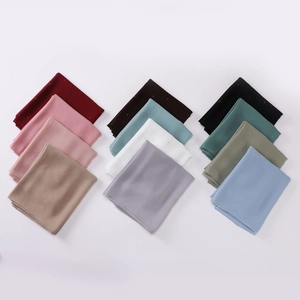 Folded multi-color pearl chiffon scarves with rhinestone patterns on white background