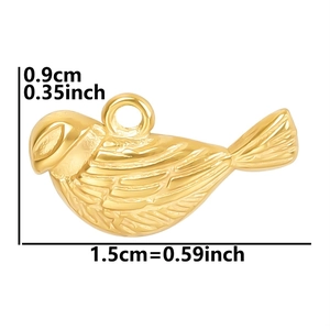 Macro detail of bird-shaped 18k gold plated pendant with 1.5cm x 0.9cm size dimensions