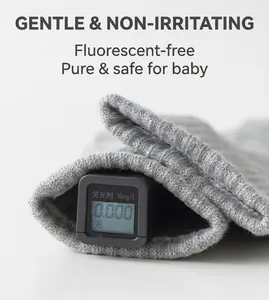 Close-up of gray cotton ribbed sock cuff with fluorecent agent detector showing zero