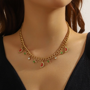 Golden chain necklace with enamel watermelon slice pendant and green beads for women