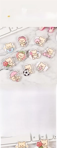 Detailed view of various cute acrylic cartoon bear brooches for bag and clothing decor