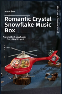 Detail of red helicopter music box with auto-snow crystal ball and warm night light