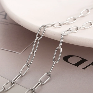 Minimalist silver paperclip chain necklace in high-polished stainless steel finish