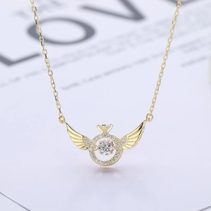 Elegant gold-plated angel wings necklace with sparkling dancing stone center pendant