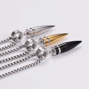 Three-color bullet pendant necklaces in silver gold and black with rhinestone details