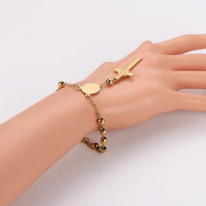 Polished gold stainless steel rosary bracelet with cross and religious medal charms