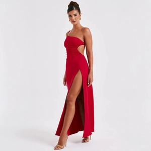 Detail of red one-shoulder dress featuring side waist cutout and a high leg slit