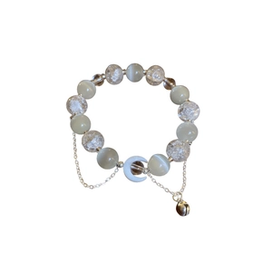 Beaded moon bracelet with cat-eye stones, white moon charm, and small silver bells