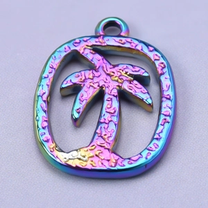 Macro shot of 304 stainless steel rainbow coconut tree pendant with textured surface