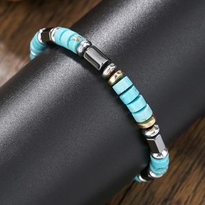 Men's fashion bracelet with blue turquoise beads and dark grey metallic accents