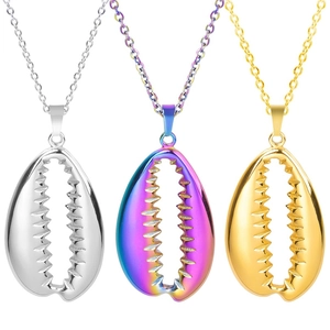 Three dainty shell pendants in silver, rainbow, and 18k gold finishes on metal chains