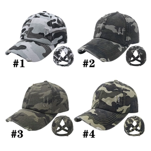 Distressed camo ponytail baseball caps in four colors featuring crisscross elastic back bands