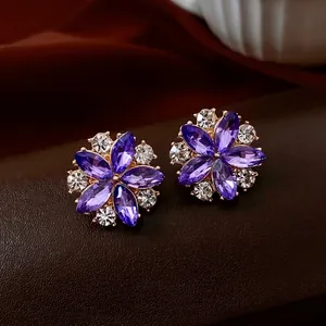 Exquisite floral stud earrings with purple marquise gems and sparkling rhinestone accents