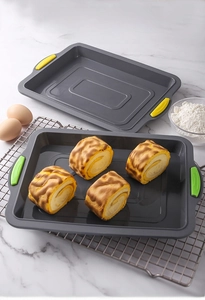 Close-up of flexible rectangular silicone brownie pan with colorful non-slip side handles