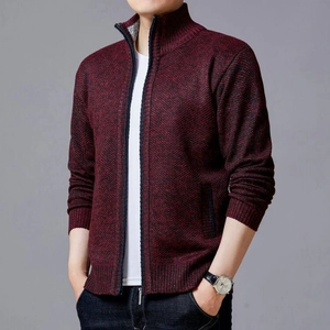 Detail of dark burgundy knit cardigan featuring a standing collar and smooth zipper closure