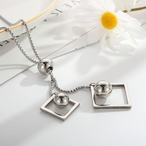 Silver geometric titanium steel necklace with square pendants and a central round bead