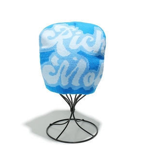 Close-up of blue and white knitted beanie featuring Pick & Roll jacquard pattern
