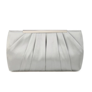 Detail of silver pleated satin fabric texture on the elegant evening clutch bag