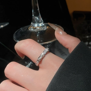 Macro shot of silver ring featuring rectangle geometric cubic zirconia and high-polish finish