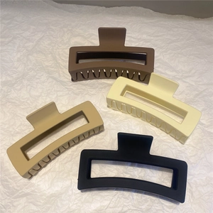 Set of 4 matte resin rectangular hollow hair claws in brown, beige, black, and cream white