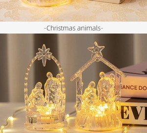 Detailed view of glowing acrylic Nativity scene with warm white LED lights for Christmas
