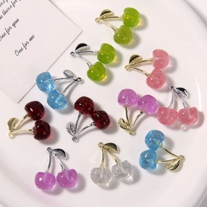 Glitter resin cherry charms with metal leaves in various colors for DIY jewelry making