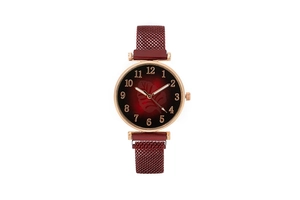 Detail view of fashion quartz watch featuring red gradient leaf dial and rose gold case