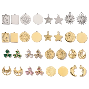 Polished stainless steel charms featuring sun moon and star motifs in gold and silver