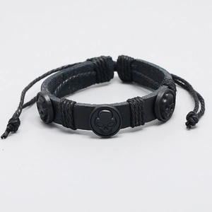 Bracelet rétro en cuir noir pour homme avec trois crânes et cordon tressé réglable