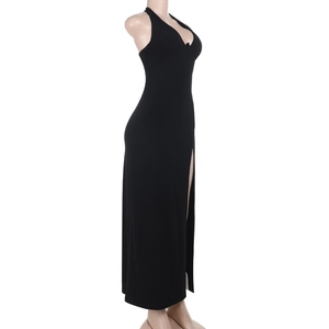 Detail view of black bodycon maxi dress featuring a high side slit and halter neck design